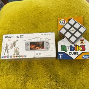 Pap- Kiii Handheld Video Game & Rubin's Cube New Factory
Sealed
